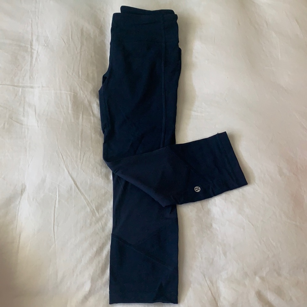Lululemon Deep Teal Blue Invigorate tight 21” Crop Leggings size 4